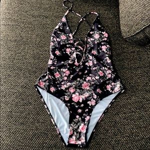 Woman’s strappy Low Cut swimsuit size L Black Pink